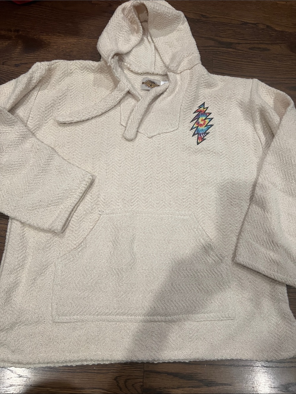 Cream Hooded Baja Pullover with Multicolor Lightning Patch